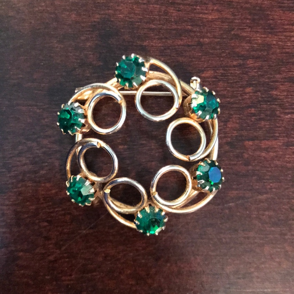 Vintage “Emerald” and gold plated brooch